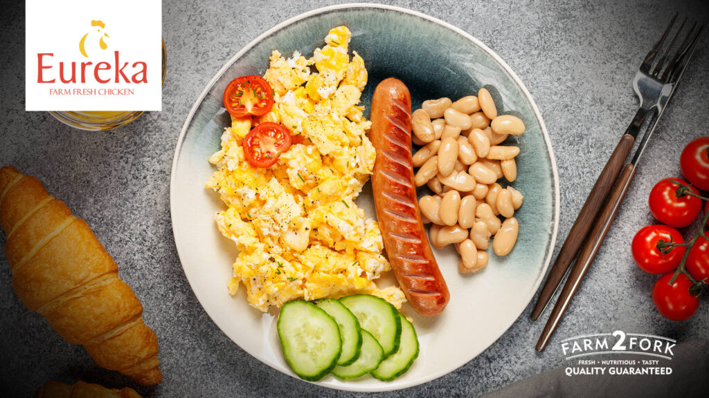 Plated scrambled eggs, Eureka vienna sausage, beans and cucumber slices | Eureka Chicken Vienna
